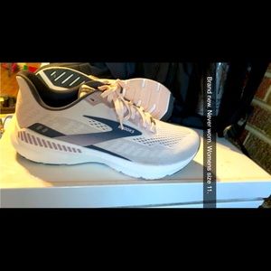 Brand new. Never worn. Brooks